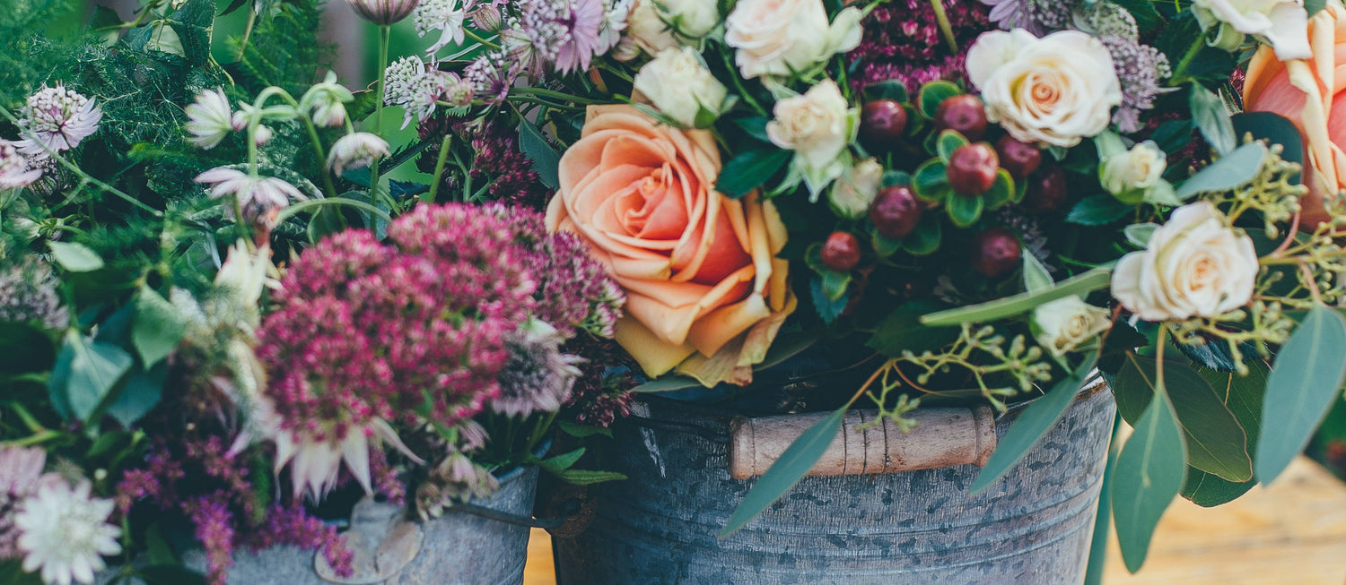 Flowers in buckets