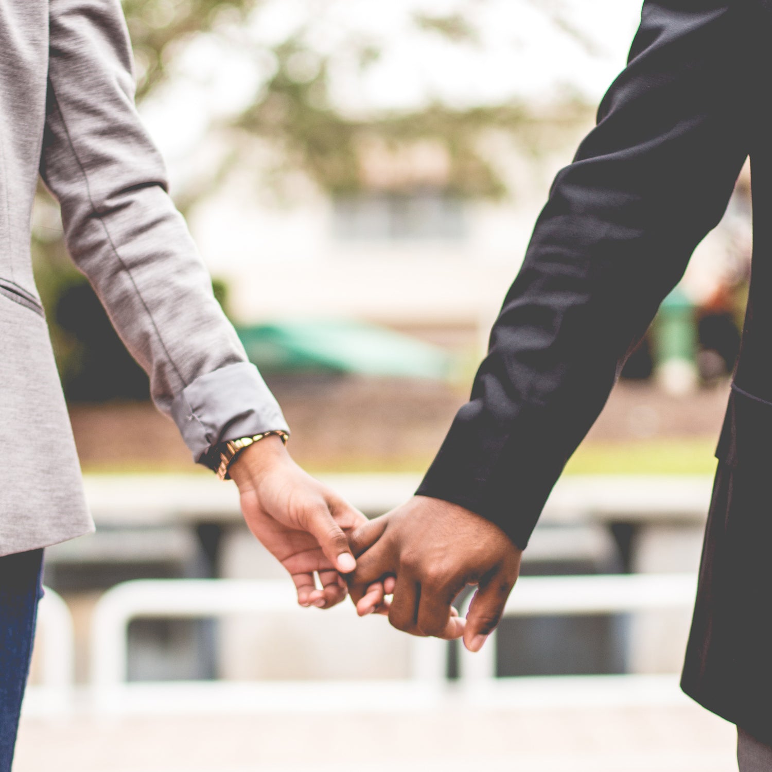 Couple holding hands