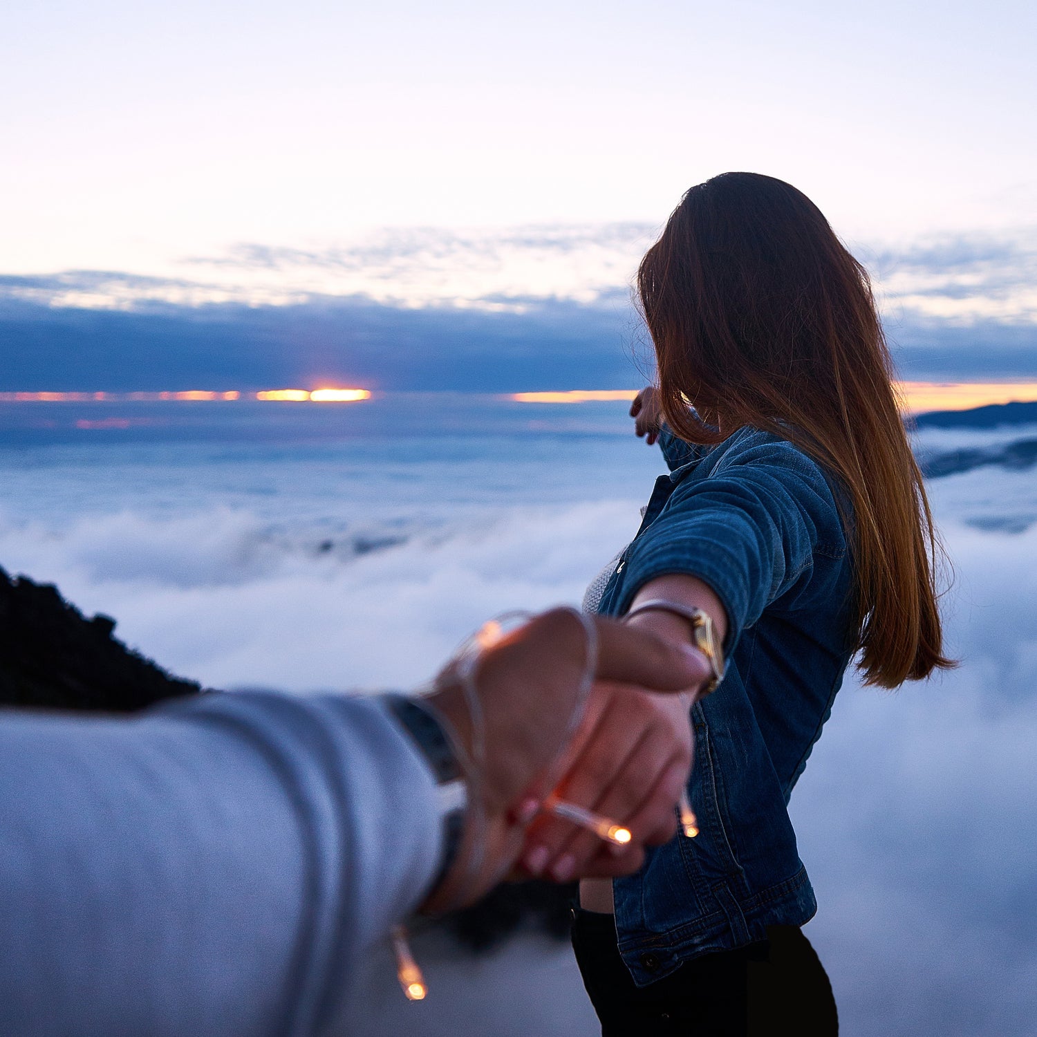 Romantic couple holding hands