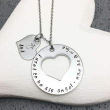 Memorial necklace, stamped with 'Dad' and an angel